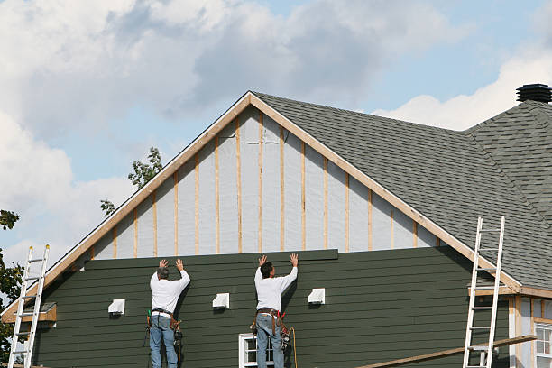 Professional Siding technician working in Upper Falls, MD
